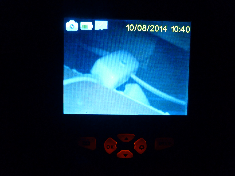 Borescope view of an electrical J box in the ceiling